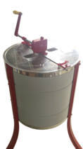 le-travail-en-miellerie-l-extraction-extraction-manuelle-extracteur-9-1-2-lega-manuel-cage-inox-engrenage-helicoidal-metal-sans-grille