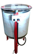 le-travail-en-miellerie-l-extraction-extraction-electrique-extracteur-9-1-2-lega-moteur-eloba-cage-resine-jaune